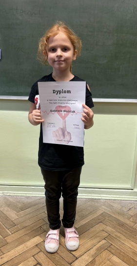 „NIE B�DZ OBOJ�TNY - RATUJ �YCIE”